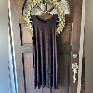 Black midi dress, sleeveless with pockets. Cute to pair with cardigan or jacket